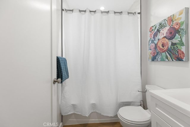 11541 Basye St, El Monte, CA 91732 - bathroom featuring wood finished floors, toilet, vanity, and shower / bath combo