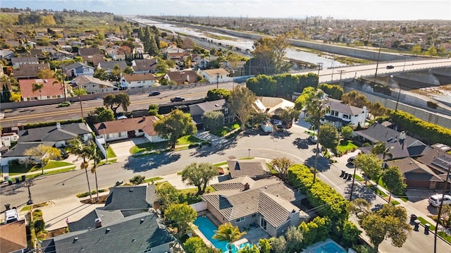 birds eye view of property with a residential view