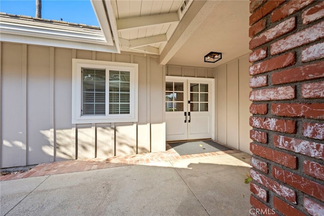 doorway to property with board and batten siding