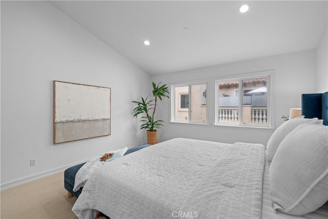 carpeted bedroom featuring recessed lighting, baseboards, and lofted ceiling