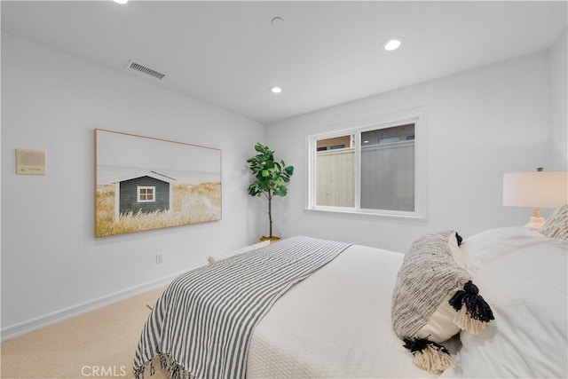 carpeted bedroom featuring visible vents, recessed lighting, and baseboards