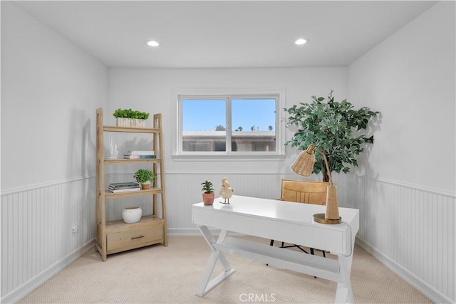 home office featuring recessed lighting, carpet, and a wainscoted wall