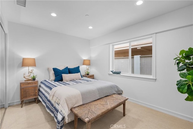 bedroom featuring recessed lighting, visible vents, baseboards, and carpet