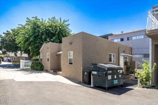 view of property exterior with stucco siding