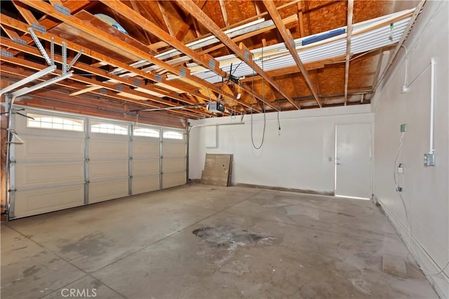 garage featuring a garage door opener