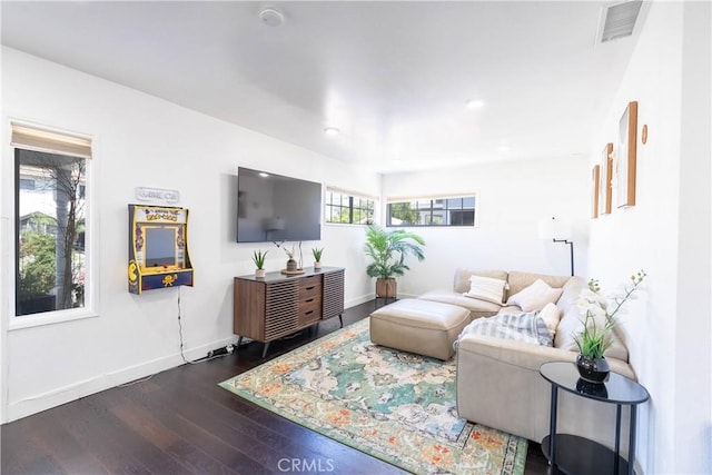11894 Truro Ave, Hawthorne, CA 90250 - living room with dark wood-style floors, visible vents, and baseboards