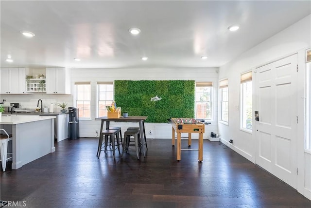 11894 Truro Ave, Hawthorne, CA 90250 - dining area featuring dark wood-style floors, recessed lighting, and a wealth of natural light