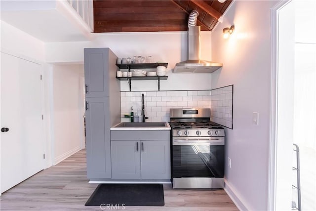 11894 Truro Ave, Hawthorne, CA 90250 - kitchen featuring gray cabinets, a sink, open shelves, decorative backsplash, and gas range