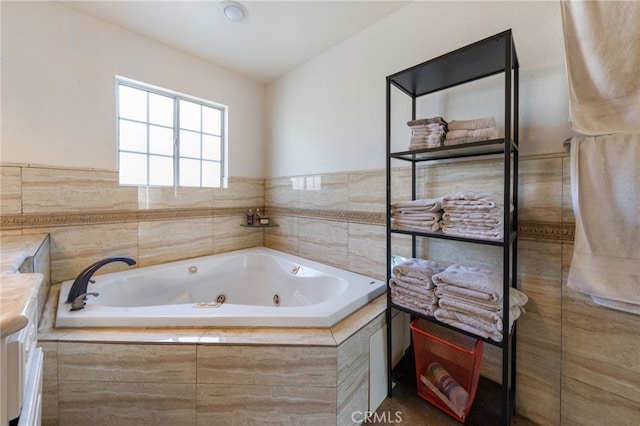 full bathroom with a jetted tub