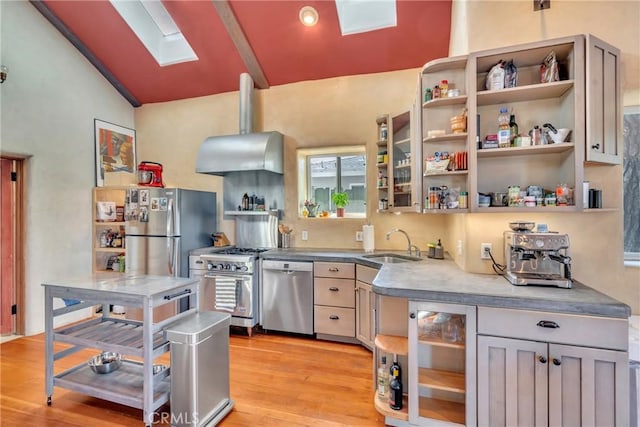 kitchen with a sink, open shelves, stainless steel appliances, and exhaust hood