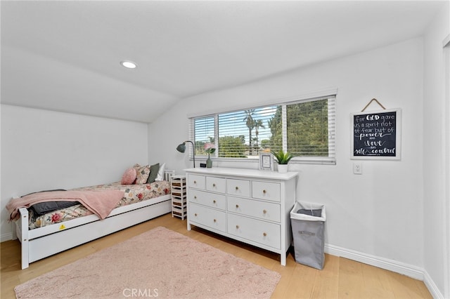 bedroom with recessed lighting, baseboards, light wood-style floors, and vaulted ceiling