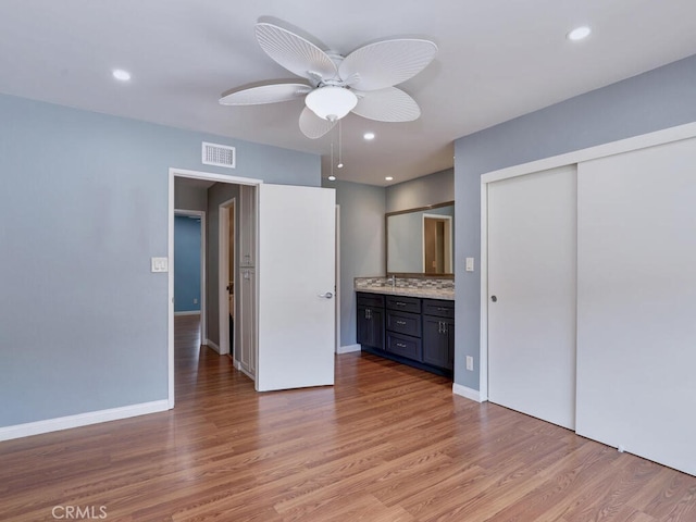 unfurnished bedroom with recessed lighting, visible vents, baseboards, and light wood-style floors