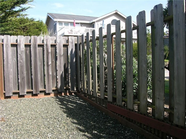 view of gate featuring fence