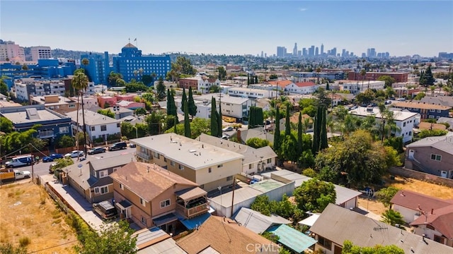 birds eye view of property with a view of city