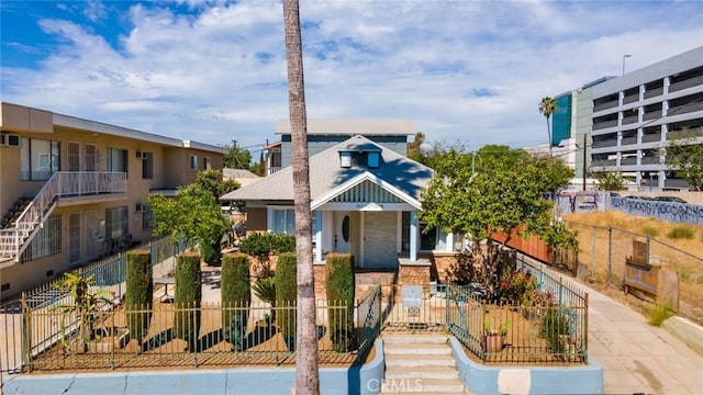 view of property featuring fence