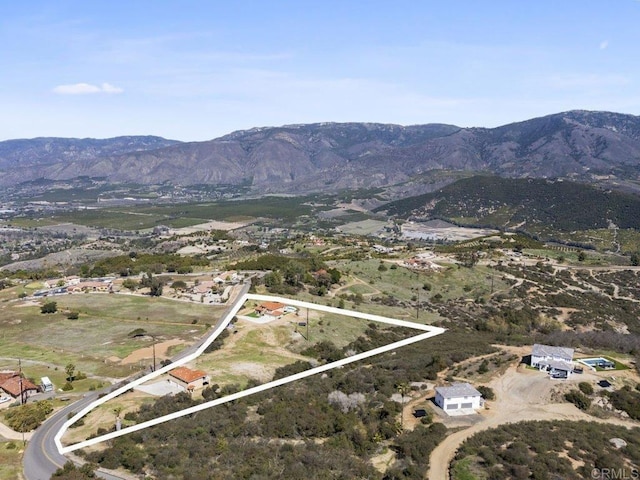 drone / aerial view featuring a mountain view