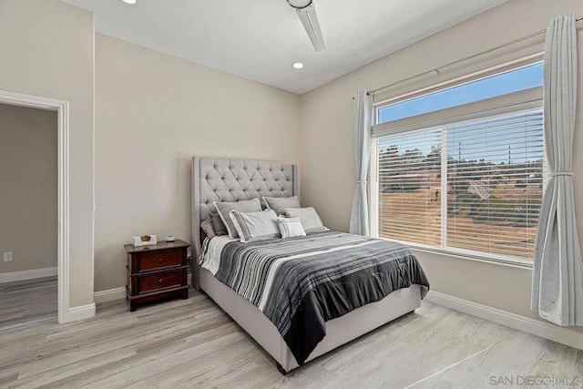 bedroom featuring recessed lighting, baseboards, and light wood finished floors