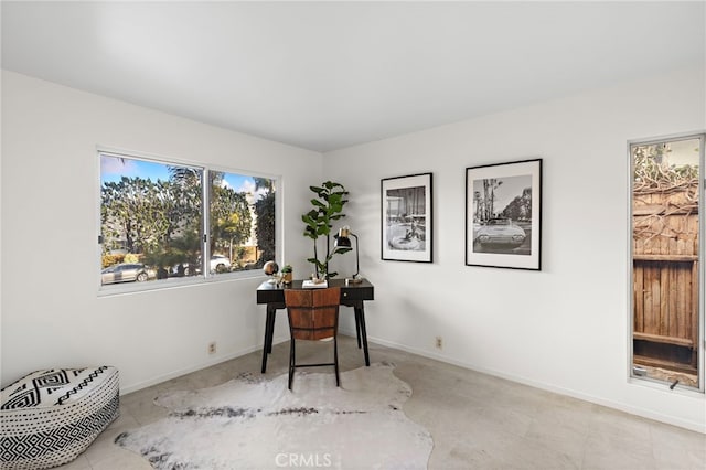 office area featuring baseboards