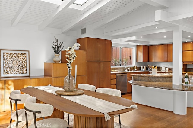 dining space featuring visible vents, light wood-style flooring, vaulted ceiling with beams, recessed lighting, and wood ceiling