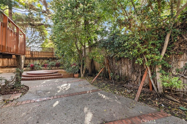 view of yard with a patio and a fenced backyard