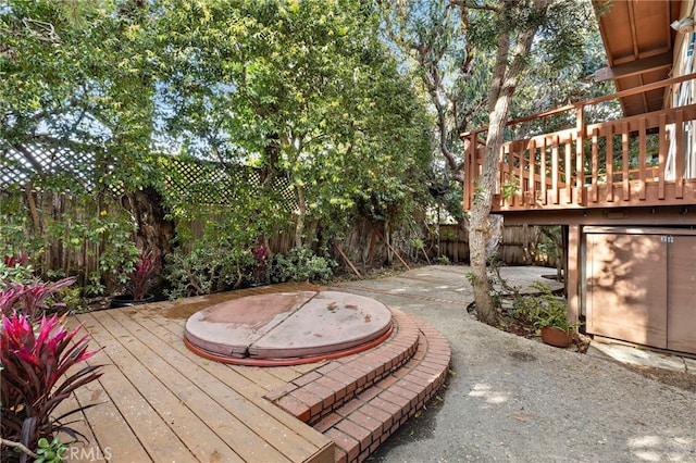 view of patio / terrace featuring a fenced backyard and a wooden deck