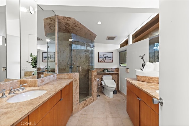 bathroom featuring visible vents, toilet, two vanities, a sink, and a shower stall