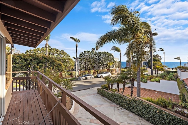 balcony featuring a water view