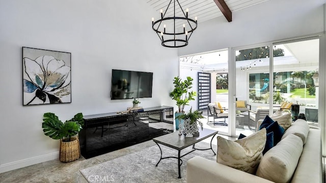 living area with baseboards, beam ceiling, and a chandelier