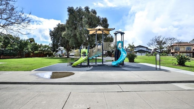 community playground with a lawn