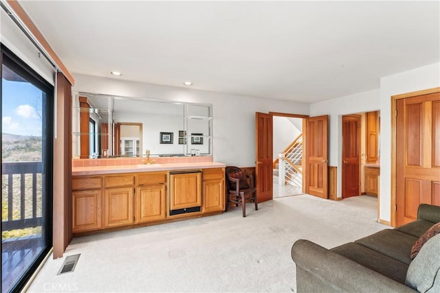 bathroom featuring recessed lighting, visible vents, and vanity