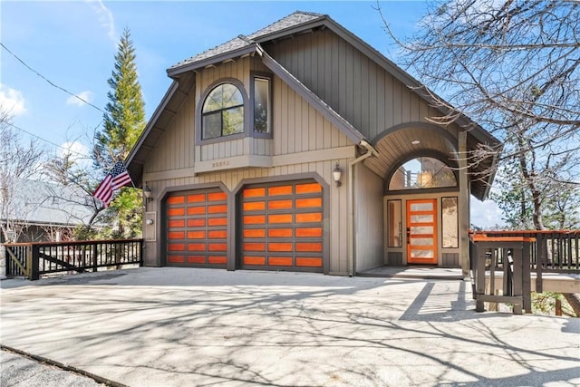 view of front of property featuring an attached garage and driveway