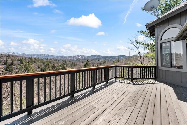 wooden terrace with a mountain view