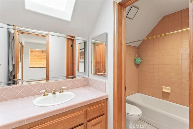 bathroom with vanity, lofted ceiling, shower / bath combination, toilet, and tasteful backsplash