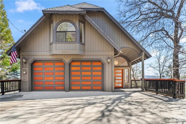 view of front of house featuring an attached garage and concrete driveway