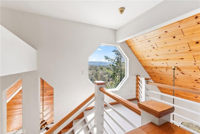 stairs with lofted ceiling