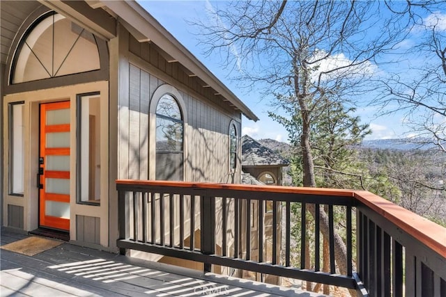 wooden terrace with a mountain view