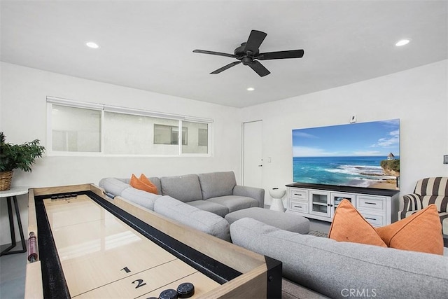 living area with recessed lighting and a ceiling fan