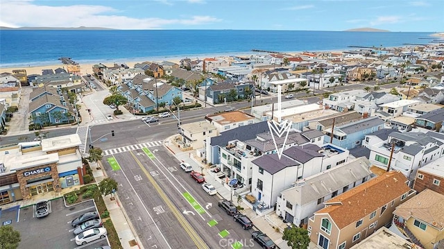 bird's eye view with a residential view and a water view