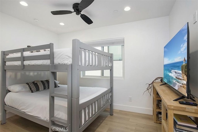 bedroom featuring recessed lighting, ceiling fan, baseboards, and wood finished floors