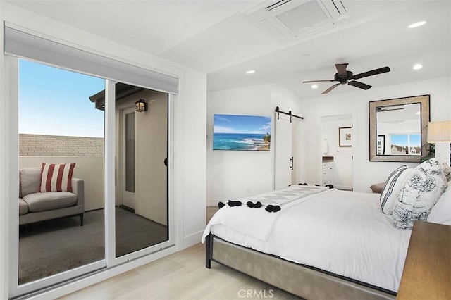 bedroom featuring visible vents, recessed lighting, light wood-type flooring, and multiple windows