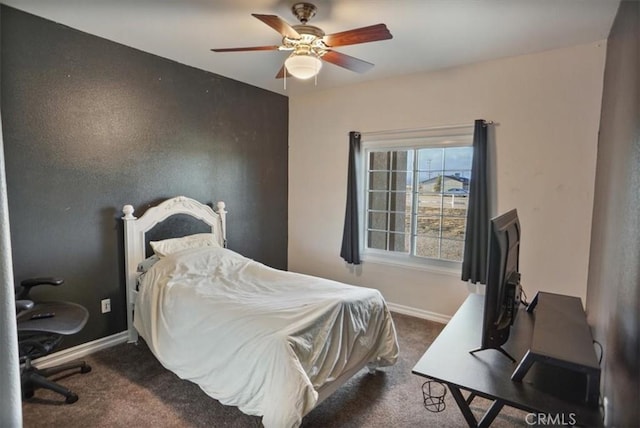 bedroom featuring baseboards, carpet, and a ceiling fan