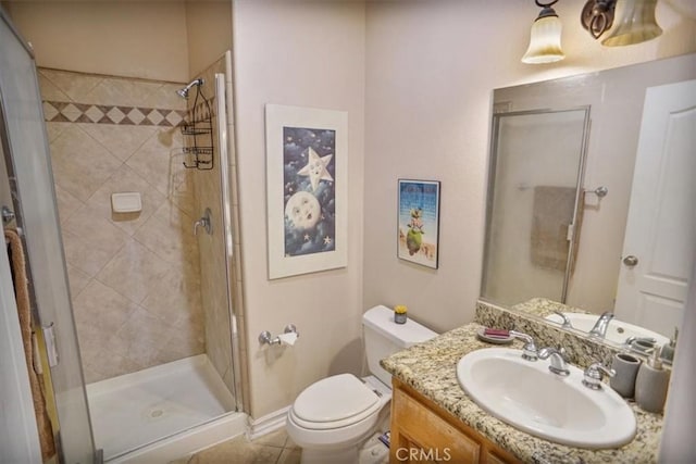 full bath featuring tile patterned floors, vanity, toilet, and a shower stall