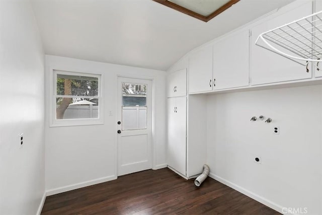 clothes washing area featuring baseboards, cabinet space, dark wood-style flooring, and electric dryer hookup