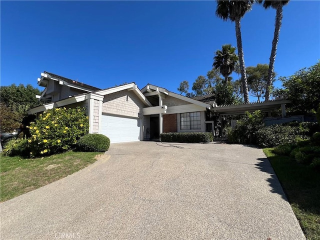 view of front facade with an attached garage and driveway