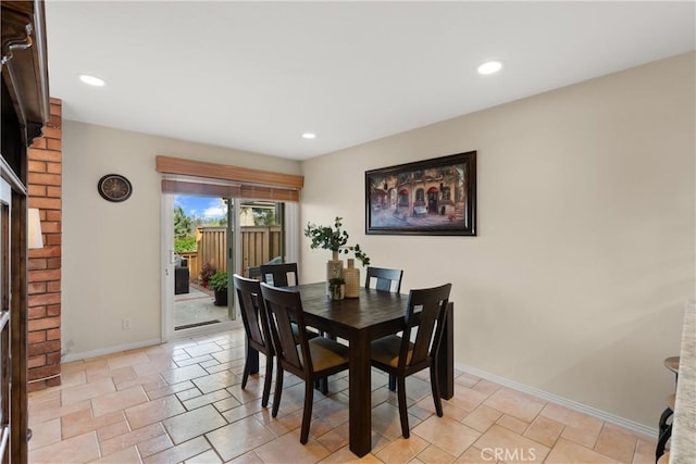 dining space featuring recessed lighting and baseboards