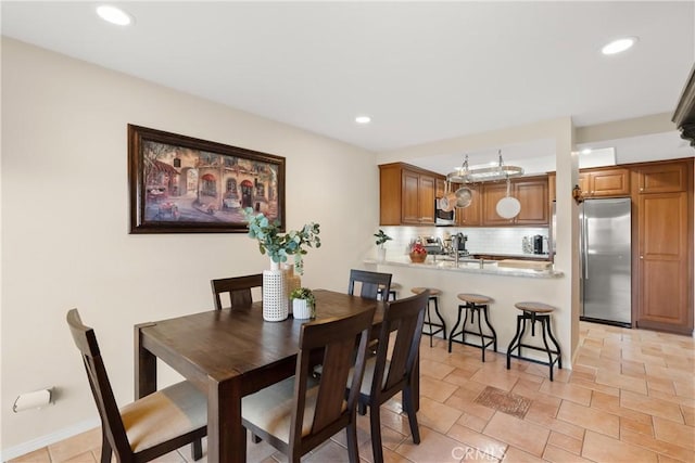 dining area with recessed lighting