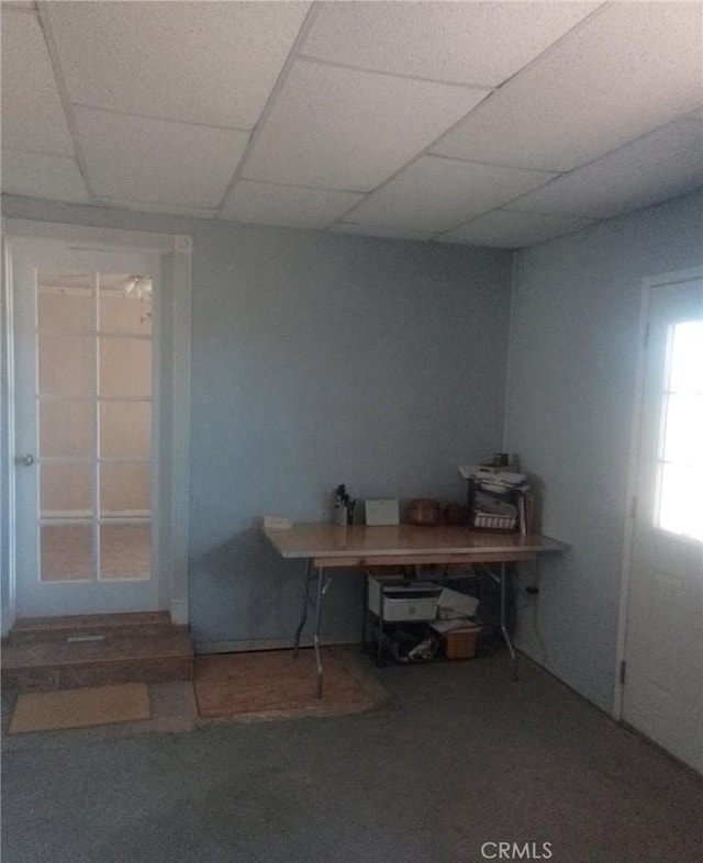 office area featuring carpet flooring and a paneled ceiling