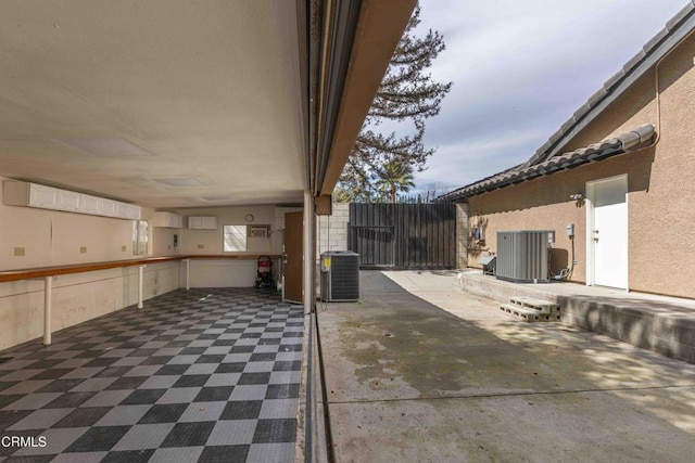 view of patio with central AC unit