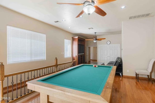 rec room with wood finished floors, recessed lighting, a ceiling fan, and visible vents