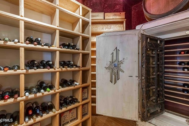 wine cellar featuring wood finished floors